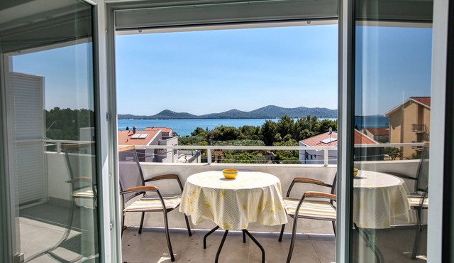 Two bedroom apartment with balcony and sea view Biograd na Moru, Biograd (A-863-b)