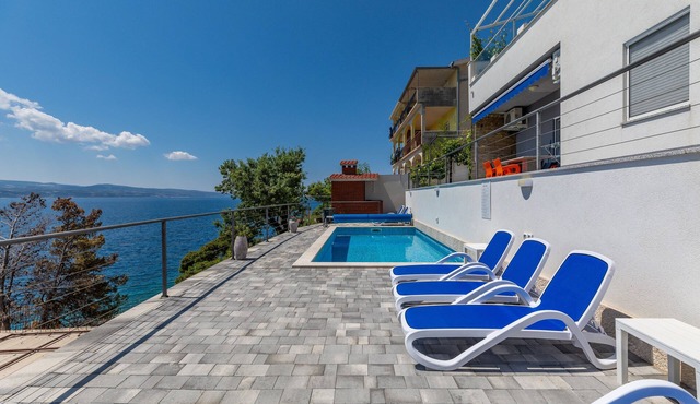 Two bedroom apartment with a swimming pool by the beach Zavode, Omiš (A-1021-a)