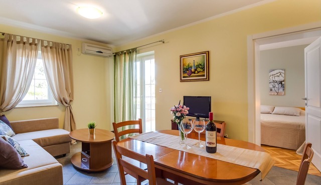 Two bedroom apartment with terrace and sea view Mali Lošinj, Lošinj (A-2505-c)