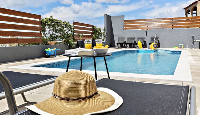 Two bedroom apartment with a swimming pool Brodarica, Šibenik (A-20248-a)