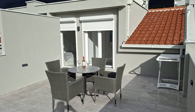 Two bedroom apartment with terrace and sea view Makarska (A-25383-b)