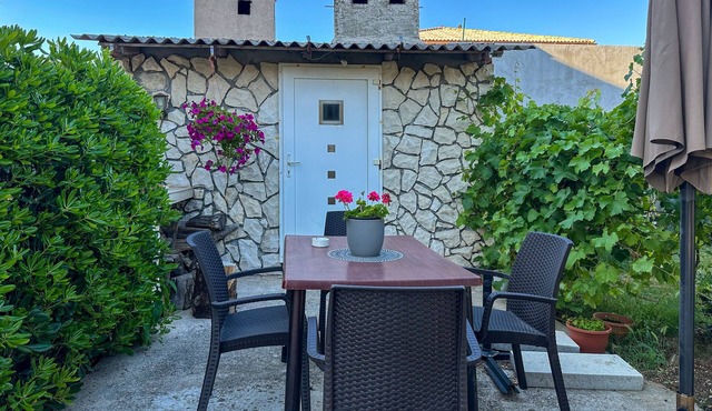 Two bedroom apartment with terrace and sea view Povljana, Pag (A-6298-a)
