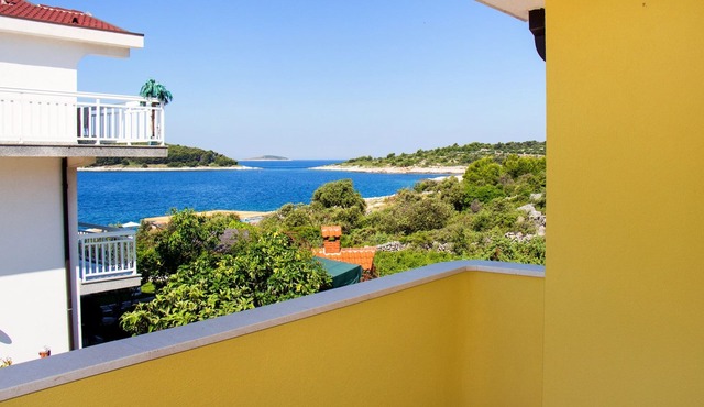 Two bedroom apartment with a swimming pool by the beach Zečevo Rtić, Rogoznica (A-11869-c)