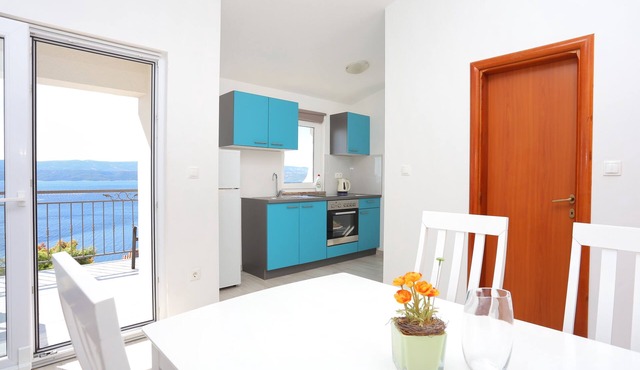 Two bedroom apartment with terrace and sea view Stanići, Omiš (A-17894-a)