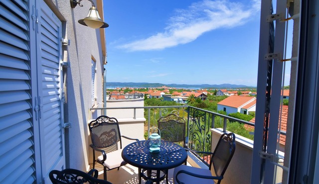 Two bedroom apartment with a swimming pool Murter (A-16655-d)
