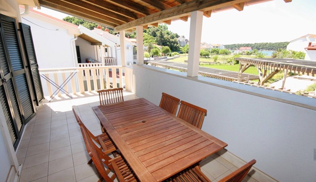 Two bedroom apartment with a swimming pool Palit (Rab) (A-3212-c)