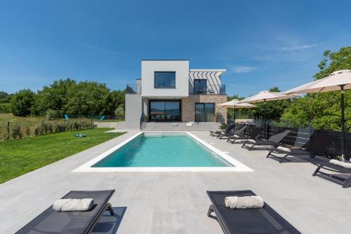 Villa Ani for 8 people near Labin Rabac with private pool and children playground in Potpićan
