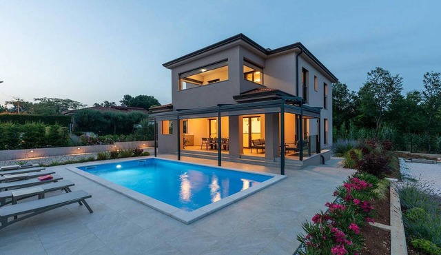 Villa Karina is a newly built holiday home with pool near town of Porec and the beach.