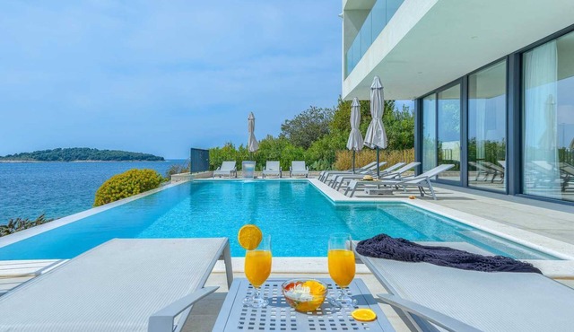 Villa Marvella - luxury waterfront villa with a heated pool and a sauna for 10 guests by MyWaycation