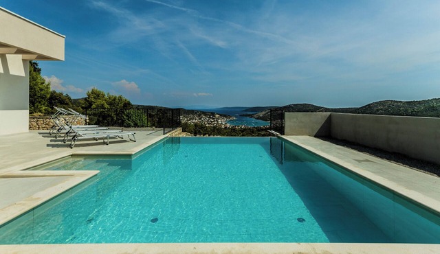 Villa Morska vila with pool and spectacular views in a small fishing village.