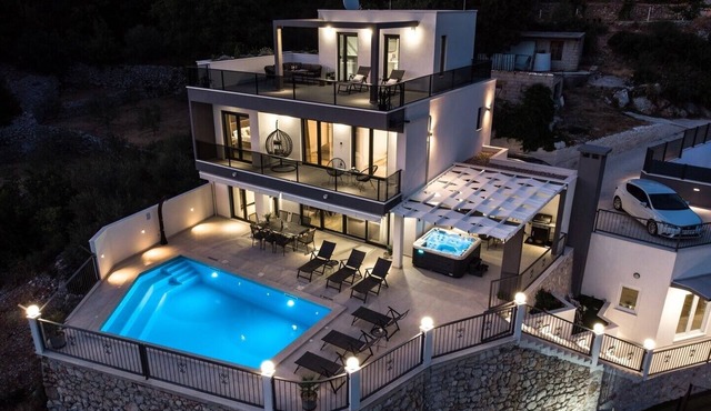 Villa Neda - modern and comfortable accommodation with a Heated pool with massage, Whirlpool, Infrared Sauna, view of Cetina, and natural environment of the Omiš hinterland