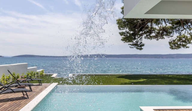Villa Sea Star - seafront beach with heated 80m2 pool, BBQ and car garage.