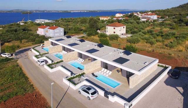 Villa Summer Bloom - sister villas each with a pool, 100m from the beach by MyWaycation in Pašman