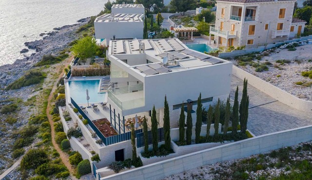 Villa Valiosa - stunning beachfront villa with a pool and a sauna for ten guests by MyWaycation