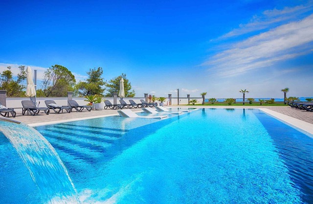 Holiday apartment Modern with pool, quiet location, lake view for 4 people