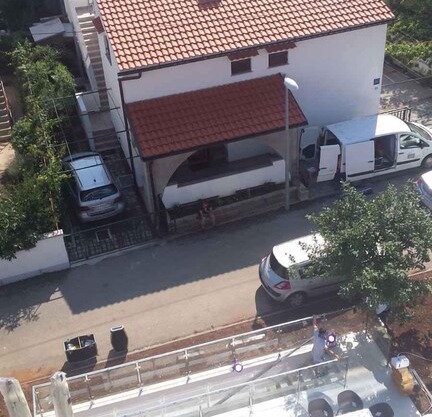 Holiday apartment with balcony and air conditioning