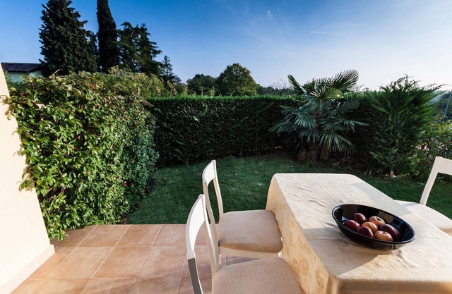 Holiday apartment with private garden and terrace