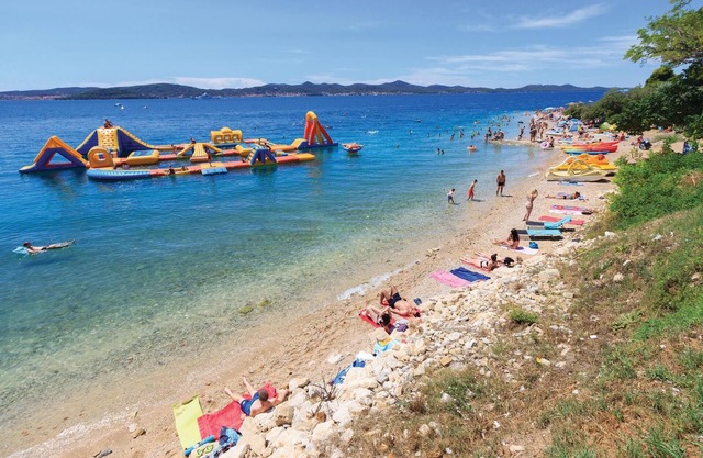 These beautiful and comfortable apartments are located near the sea.