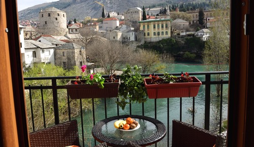 Double room with extra bed , balcony with river view