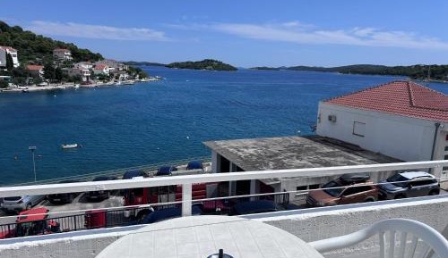 One-Bedroom Apartment with Balcony and Sea View