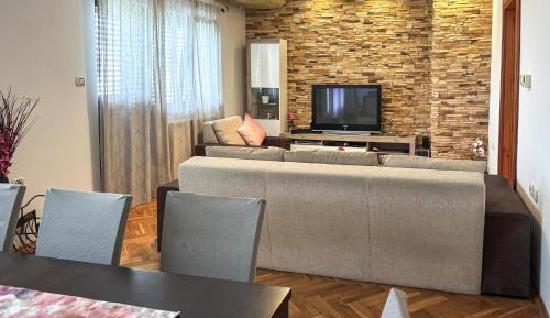 Three-Bedroom Apartment with Balcony