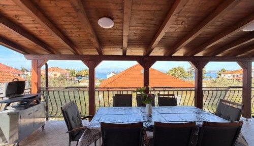 Three-Bedroom Apartment with Terrace and Sea View