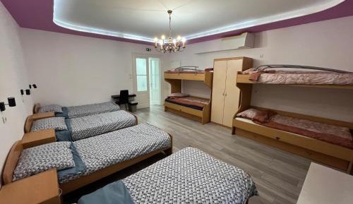 Single Bed in Dormitory Room