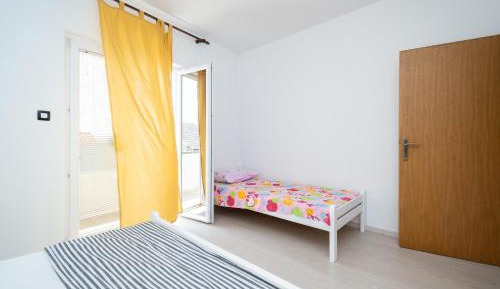 Two-Bedroom Apartment with Balcony and Sea View