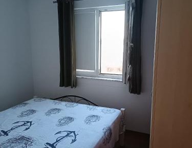 One-Bedroom Apartment with Balcony and Sea View