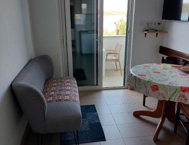 One-Bedroom Apartment with Balcony and Sea View