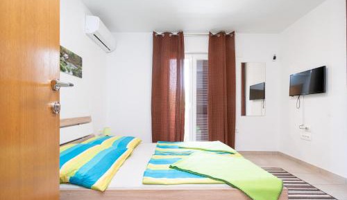 One-Bedroom Apartment with Balcony and Sea View