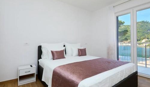One-Bedroom Apartment with Balcony and Sea View