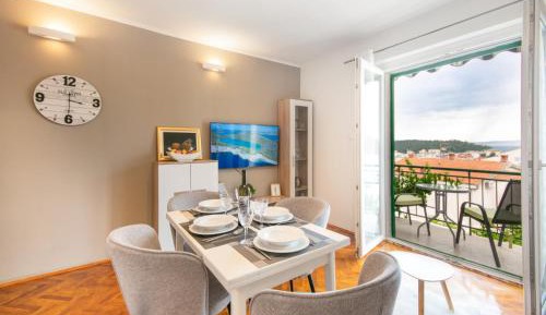 One-Bedroom Apartment with Balcony and Sea View