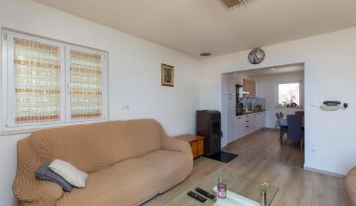 Three-Bedroom Apartment with Balcony and Sea View