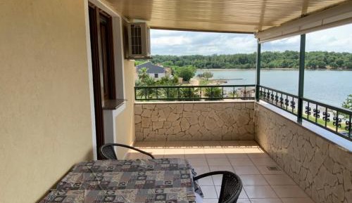 Three-Bedroom Apartment with Sea View