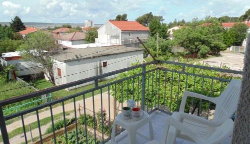 One-Bedroom Apartment with Balcony and City View