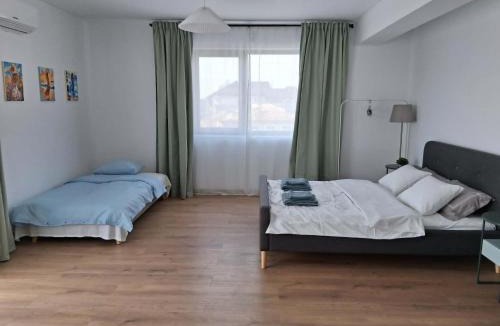 Saftica Apartment | Uniria Studio Balotești Near Therme and Otopeni Airport Free Private Parking