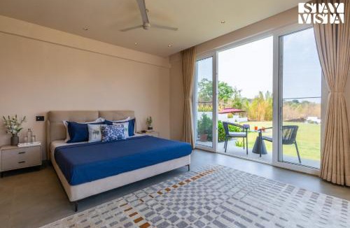Anjaneri Villa | StayVista's Vayu Farm - 4BHK Lake-View Villa with Alfresco Dining