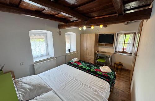 Calan House | Căsuța cu cerdac