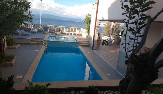Holiday apartment with heated outdoor pool