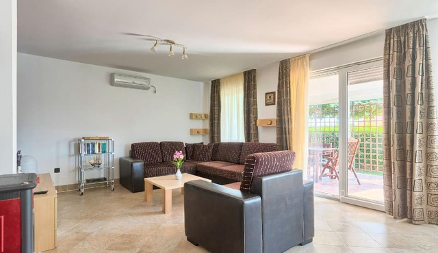 House Daniela with a roofed terrace and pool in Marcana