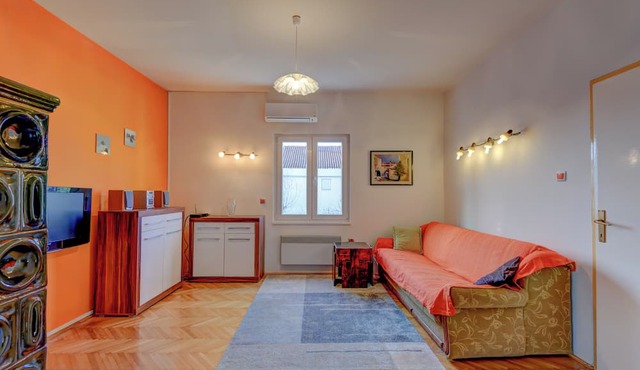 The apartments consists of two bedrooms, a bathroom, a kitchen and a living room